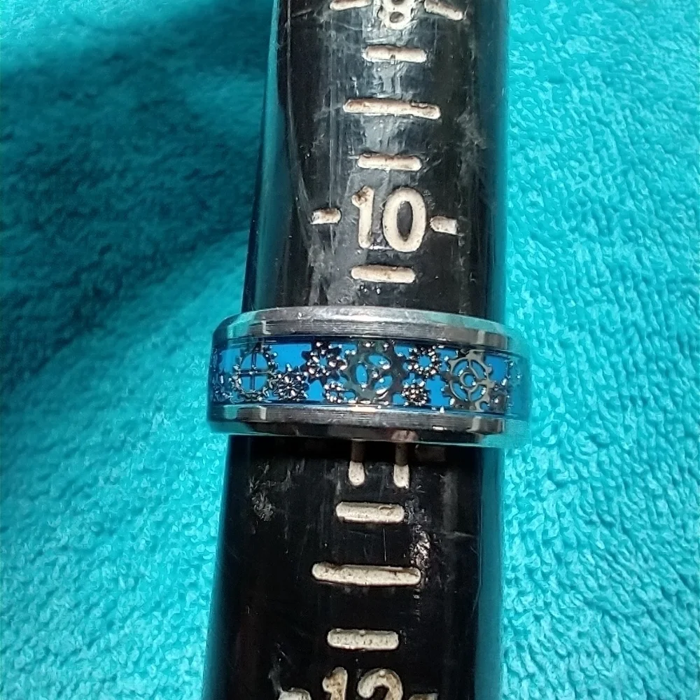 Silvertone blue industrial gear design band ring
